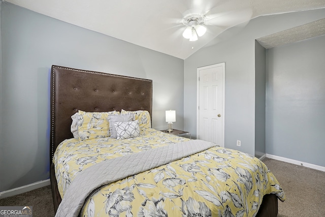 carpeted bedroom with ceiling fan and lofted ceiling