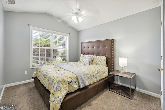 bedroom featuring lofted ceiling, ceiling fan, and carpet floors