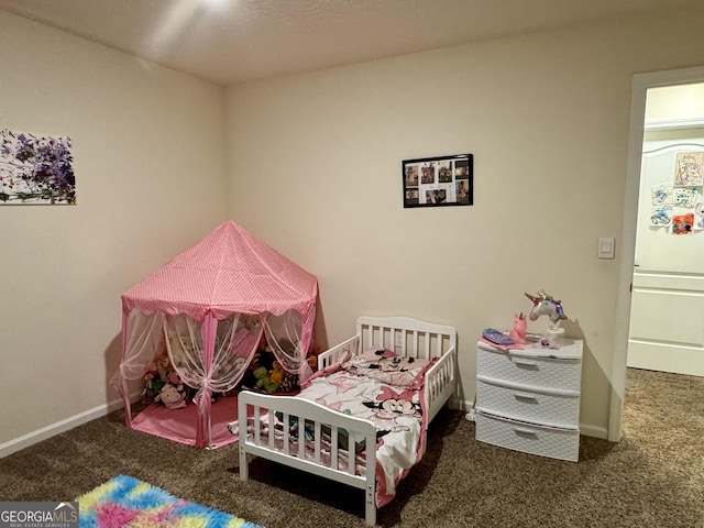 bedroom with dark carpet