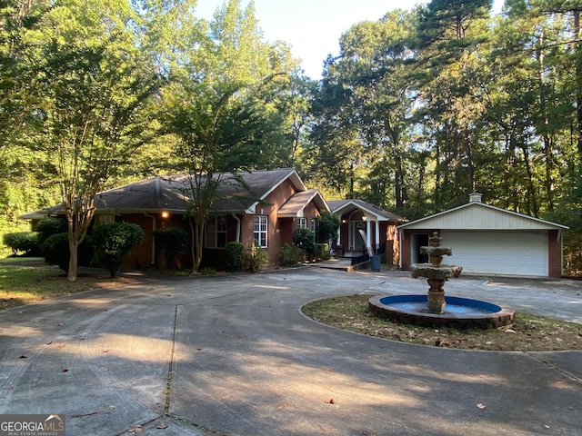 single story home with a garage