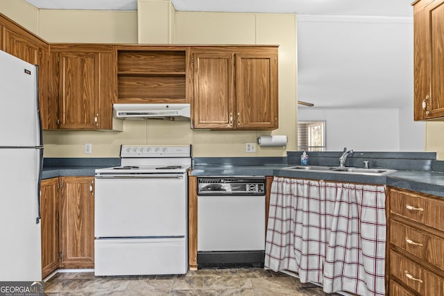 kitchen with white appliances and sink