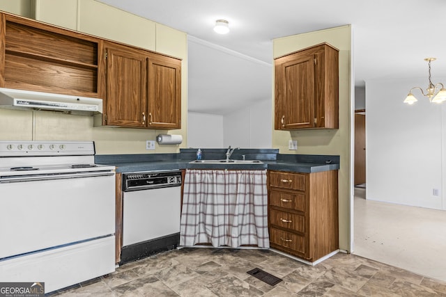 kitchen with pendant lighting, white appliances, a notable chandelier, and sink