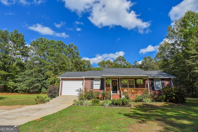 ranch-style home with a front lawn, covered porch, and a garage