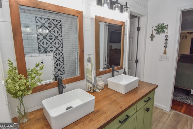 bathroom featuring wood-type flooring and vanity