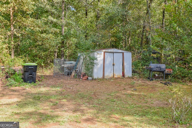 exterior space with a shed