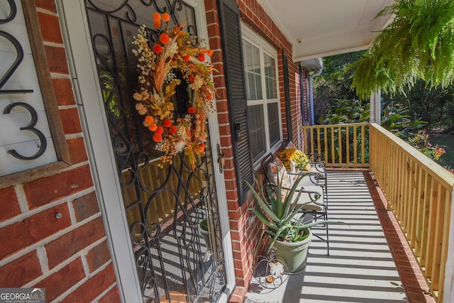 balcony featuring a porch