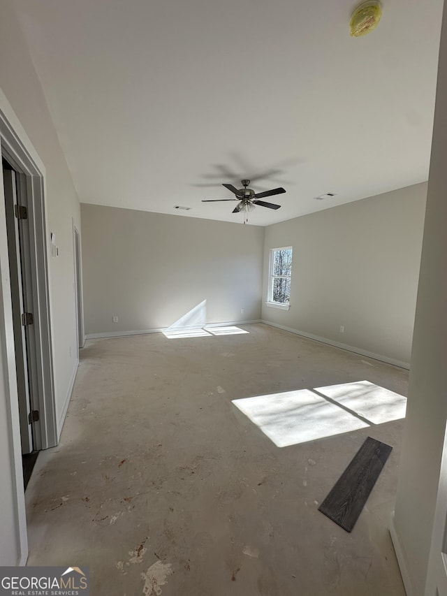 unfurnished room with ceiling fan