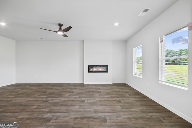 interior space featuring dark hardwood / wood-style flooring and ceiling fan