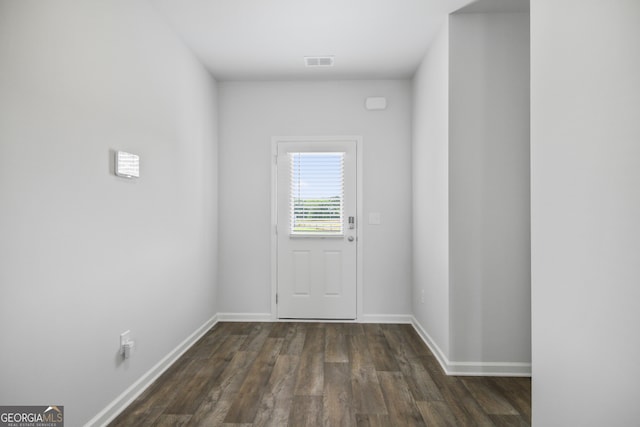 doorway to outside with dark hardwood / wood-style floors