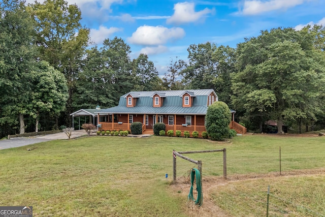 view of front of house with a porch and a front yard