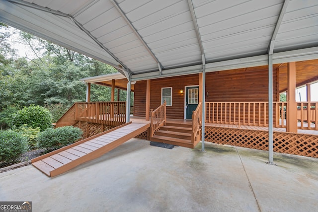 view of patio / terrace featuring a wooden deck