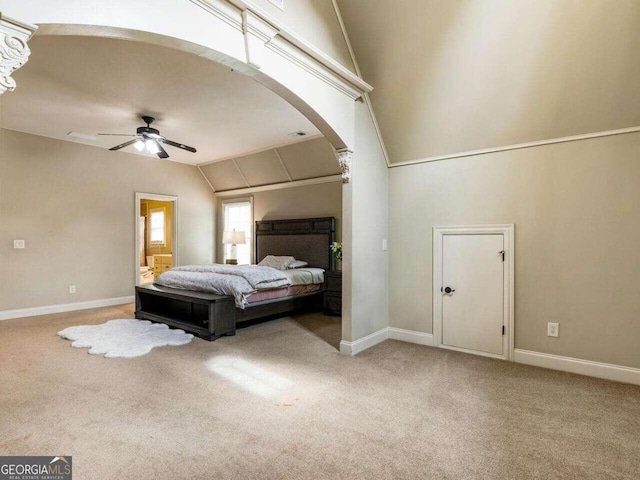 carpeted bedroom featuring lofted ceiling and ceiling fan