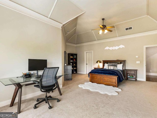 carpeted bedroom featuring crown molding, vaulted ceiling, and ceiling fan