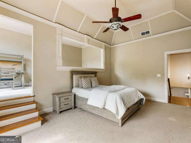 bedroom with ceiling fan, lofted ceiling, crown molding, and carpet flooring