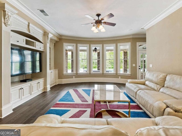 living room featuring ornamental molding, ceiling fan, and dark hardwood / wood-style floors