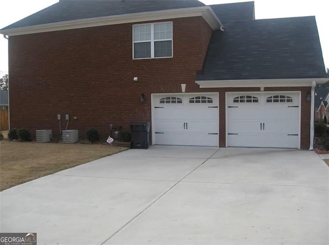 view of property exterior featuring a garage