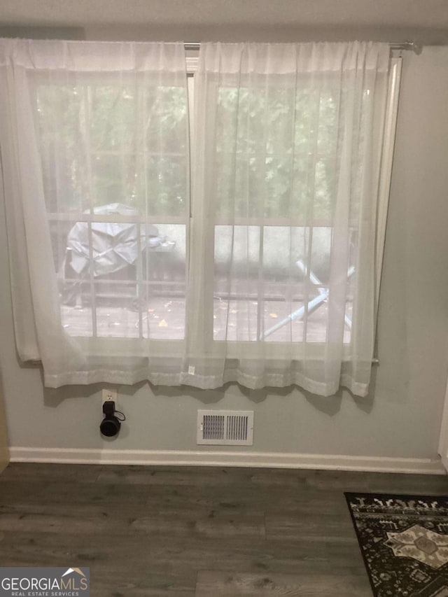 2734 Laurel View Dr, Snellville, GA 30039 - room details with wood finished floors, baseboards, and visible vents