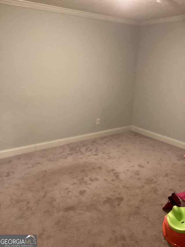 2734 Laurel View Dr, Snellville, GA 30039 - carpeted empty room with crown molding and baseboards