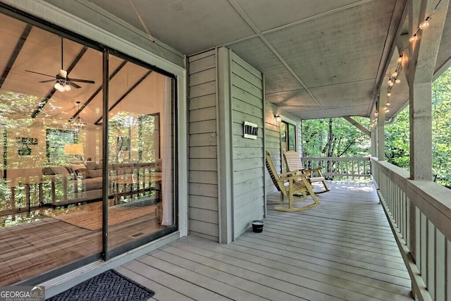 wooden terrace with ceiling fan