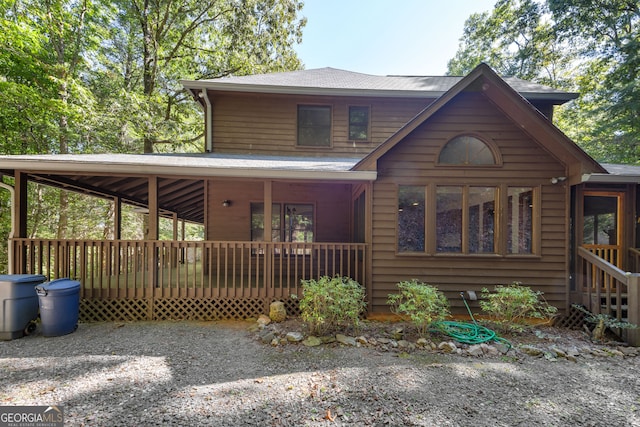 view of front facade featuring a wooden deck