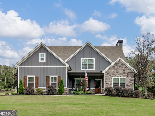 craftsman house featuring a front yard