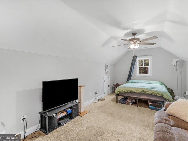 bedroom with lofted ceiling, carpet, and ceiling fan