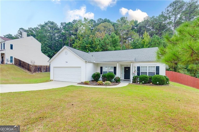 ranch-style home with a garage and a front lawn