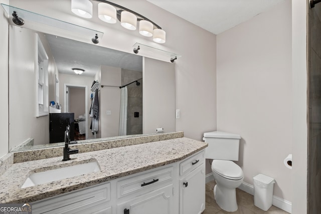 bathroom featuring a shower with curtain, tile patterned floors, toilet, and vanity