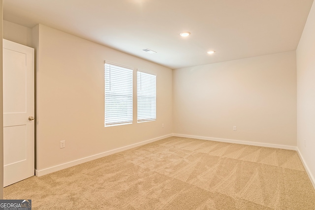 view of carpeted spare room