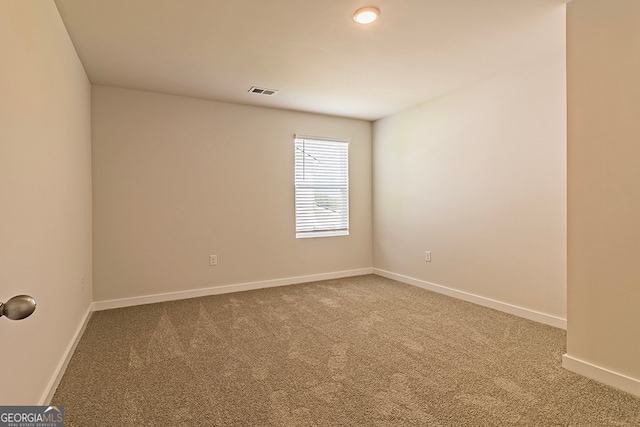 view of carpeted spare room