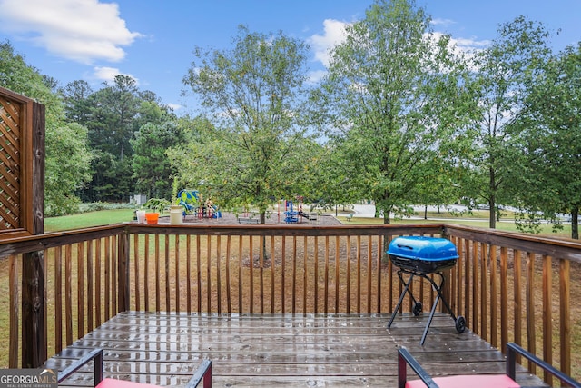 wooden deck with a playground