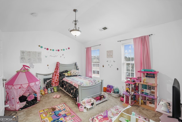 bedroom with carpet and vaulted ceiling