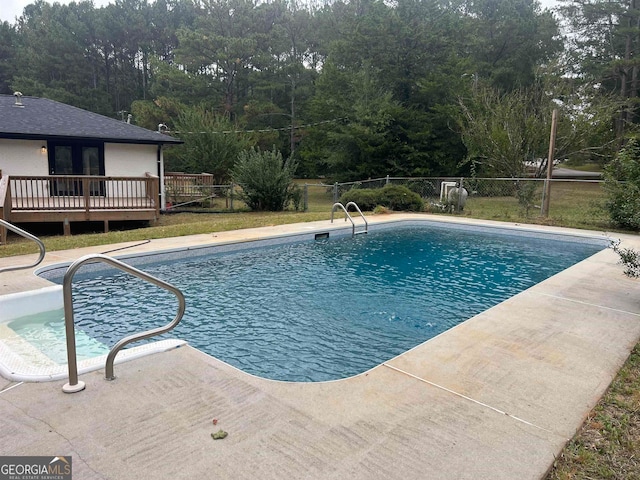 view of pool featuring a deck