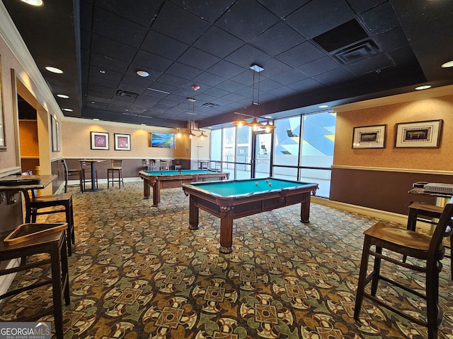 rec room featuring ornamental molding, pool table, a raised ceiling, and a paneled ceiling