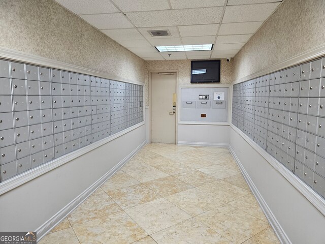 view of home's community featuring mail boxes