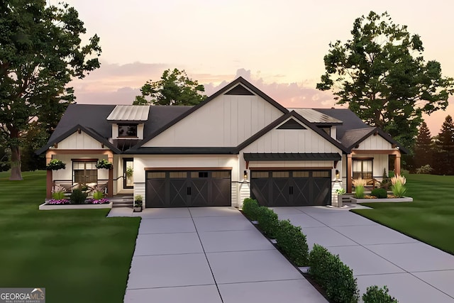 view of front facade featuring a yard and a garage