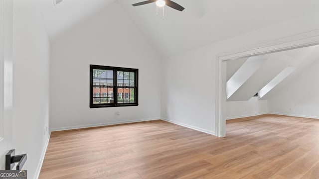 bonus room featuring high vaulted ceiling, light wood-type flooring, and ceiling fan