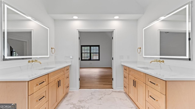 bathroom featuring vanity and hardwood / wood-style floors