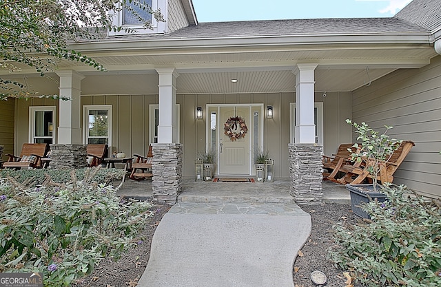 entrance to property featuring covered porch