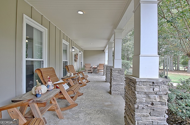 view of patio featuring a porch