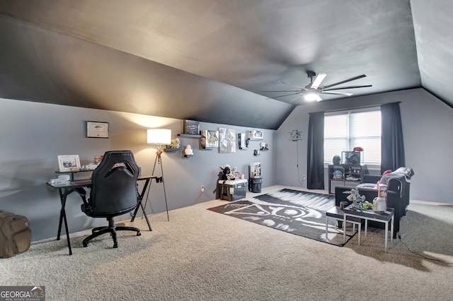 carpeted office featuring ceiling fan and vaulted ceiling