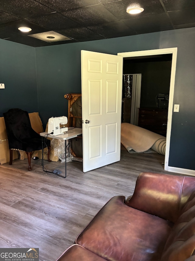 living area with hardwood / wood-style floors