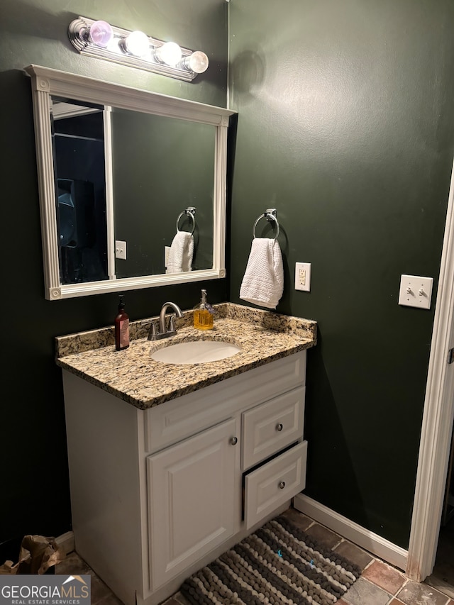 bathroom featuring vanity and tile patterned floors