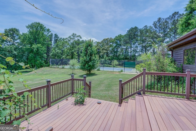 wooden deck with a yard