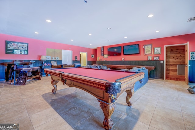 recreation room featuring wood walls, light tile patterned floors, and billiards