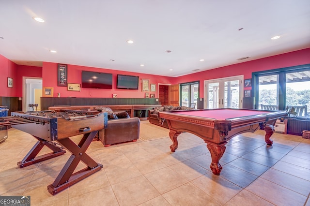 playroom featuring pool table, light tile patterned flooring, and french doors