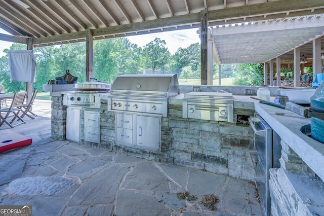 view of patio featuring area for grilling and grilling area