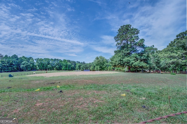 view of yard with a rural view