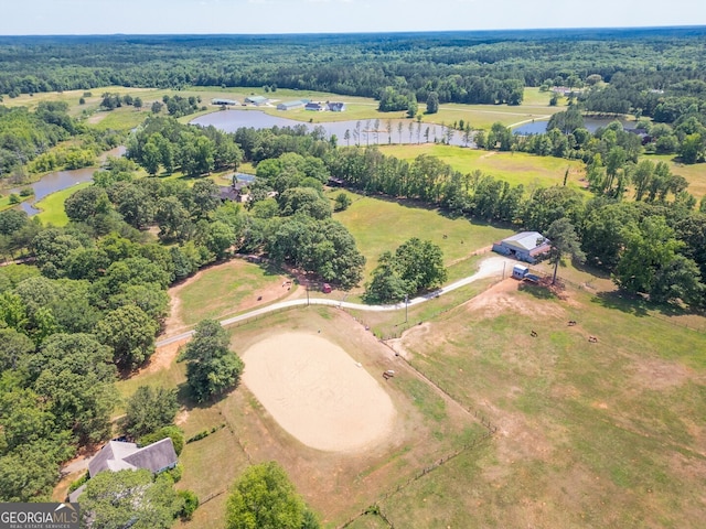 drone / aerial view featuring a water view and a rural view