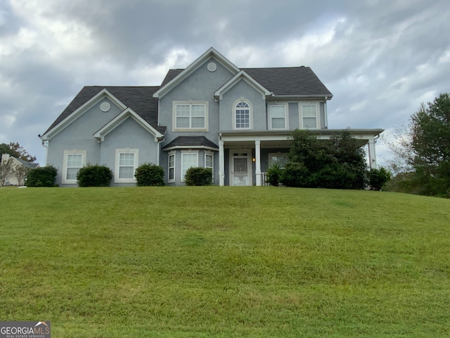 view of front facade with a front lawn